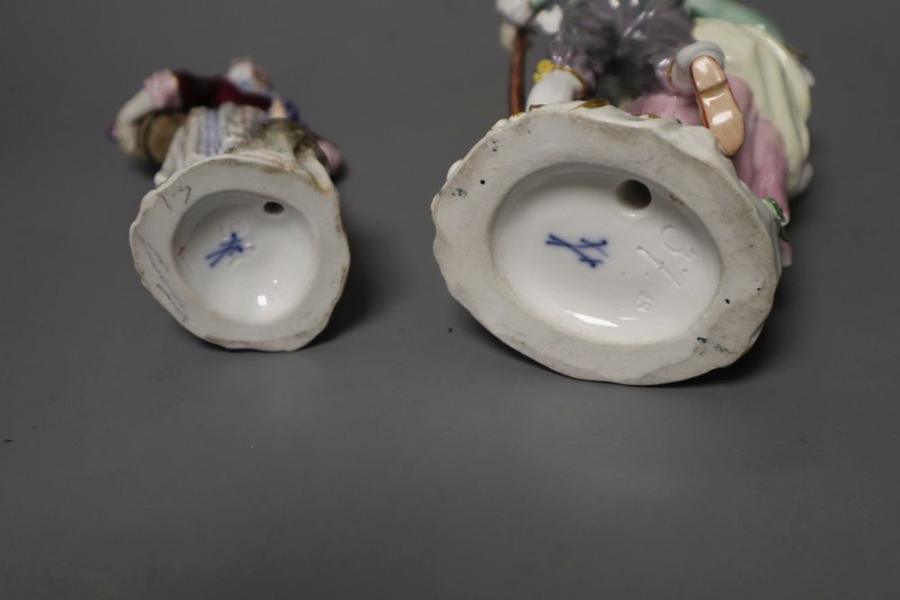 A Meissen group of a gardener and companion and a Meissen figure of a fruit seller, tallest 15cm (2)